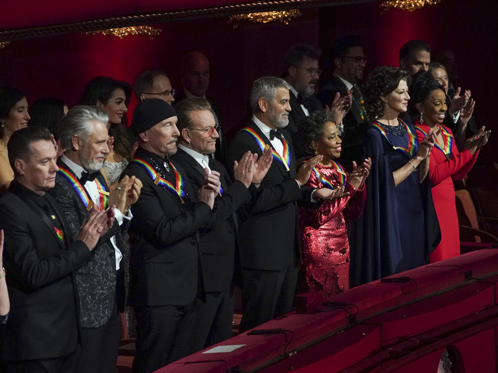 Kennedy Center honorees U2 (Larry Mullen Jr., Adam Clayton, The Edge and Bono), George Clooney, Tania León, Amy Grant and Gladys Knight.