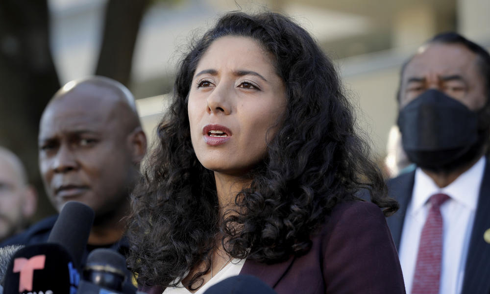 Harris County Judge Lina Hidalgo, center, a Democrat who is the top official in Texas' largest county.