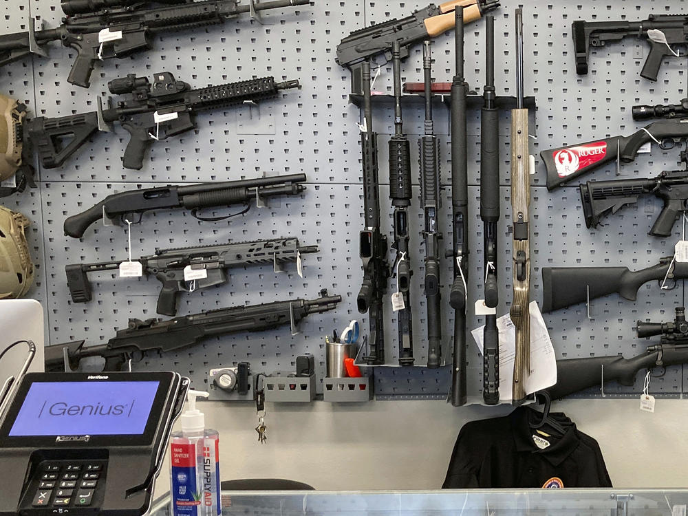Firearms are displayed at a gun shop in Salem, Ore., on Feb. 19, 2021.