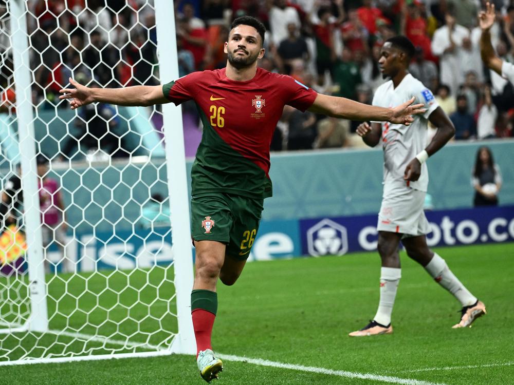 Portugal forward Gonçalo Ramos celebrates scoring his team's fifth goal, his hat-trick, during the Qatar 2022 World Cup round of 16 football match between Portugal and Switzerland on December 6, 2022.