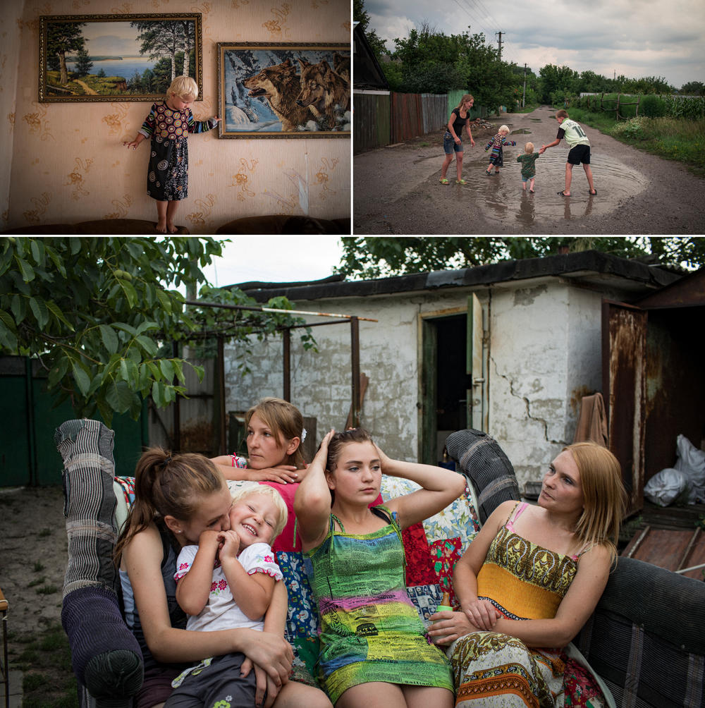 Top left: Miroslava plays in a neighbor's home. Top right: Olga watches Miroslava and Kirill play in puddles with a neighbor. Bottom, from left: Aleksandra Mountyan, Miroslava Grinik, Olga Grinik, Victoria Mountyan and Valentina Mountyan, all members of one extended family, in the backyard of Olga's house, about 50 yards from a Ukrainian front-line position. Avdiivka, Ukraine, in July 2018.