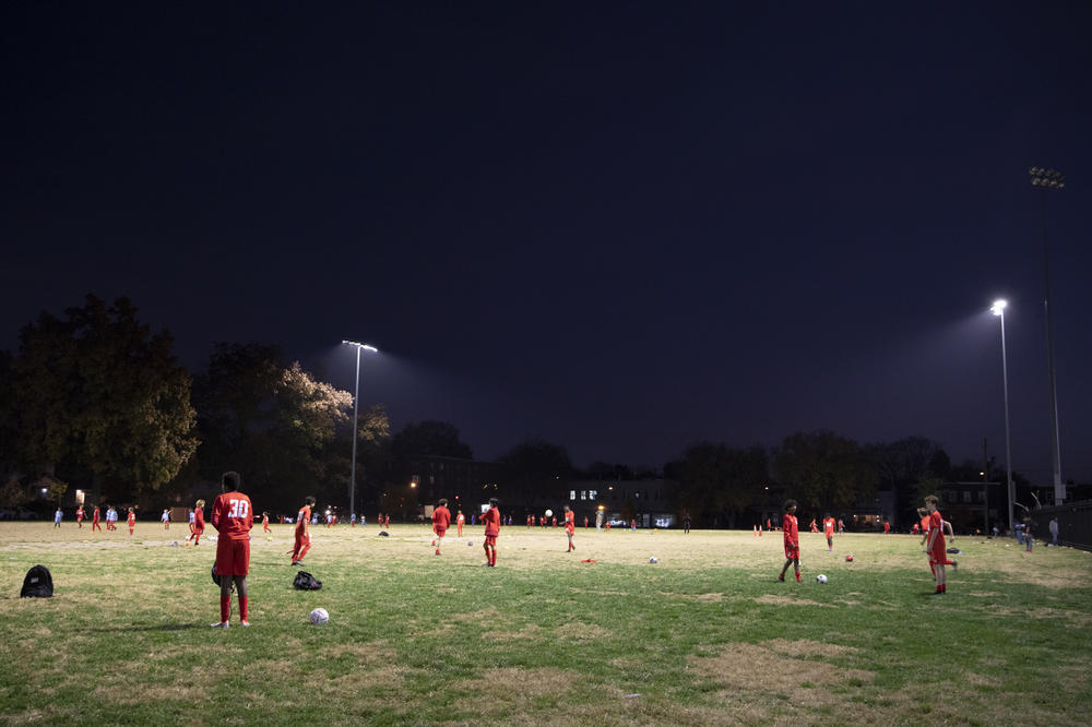 Fifteen- and 16-year-olds from DCXI soccer team practice together.