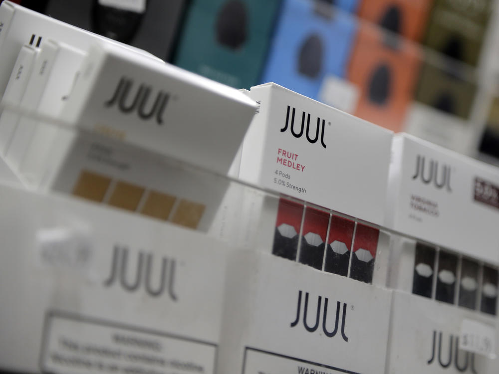 Juul products are displayed at a smoke shop in New York on Dec. 20, 2018.