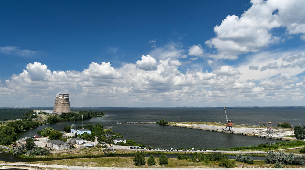 Two cooling towers from the Zaporizhzhia Nuclear Power Plant are situated on the bank of the Kakhovka Reservoir, formed on the Dnipro River, in Enerhodar, Ukraine, on July 9, 2019.