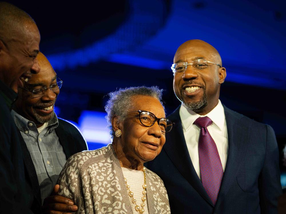 Verlene Warnock celebrates her son's election to a full term in the U.S. Senate.  In his victory speech, Warnock said his mother 