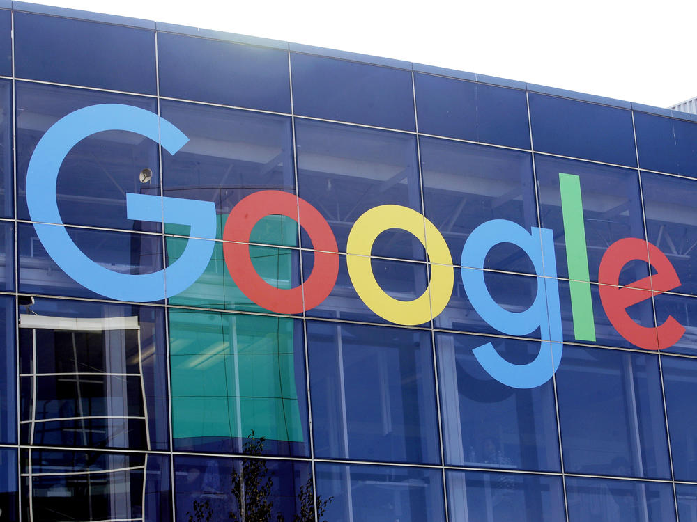 In this Sept. 24, 2019, file photo a sign is shown on a Google building at their campus in Mountain View, Calif.