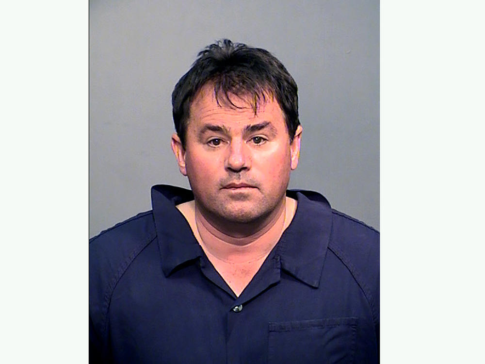 This undated photo provided by the Coconino County Sheriff's Office shows Samuel Bateman, who faces state child abuse charges, and federal charges of tampering with evidence.