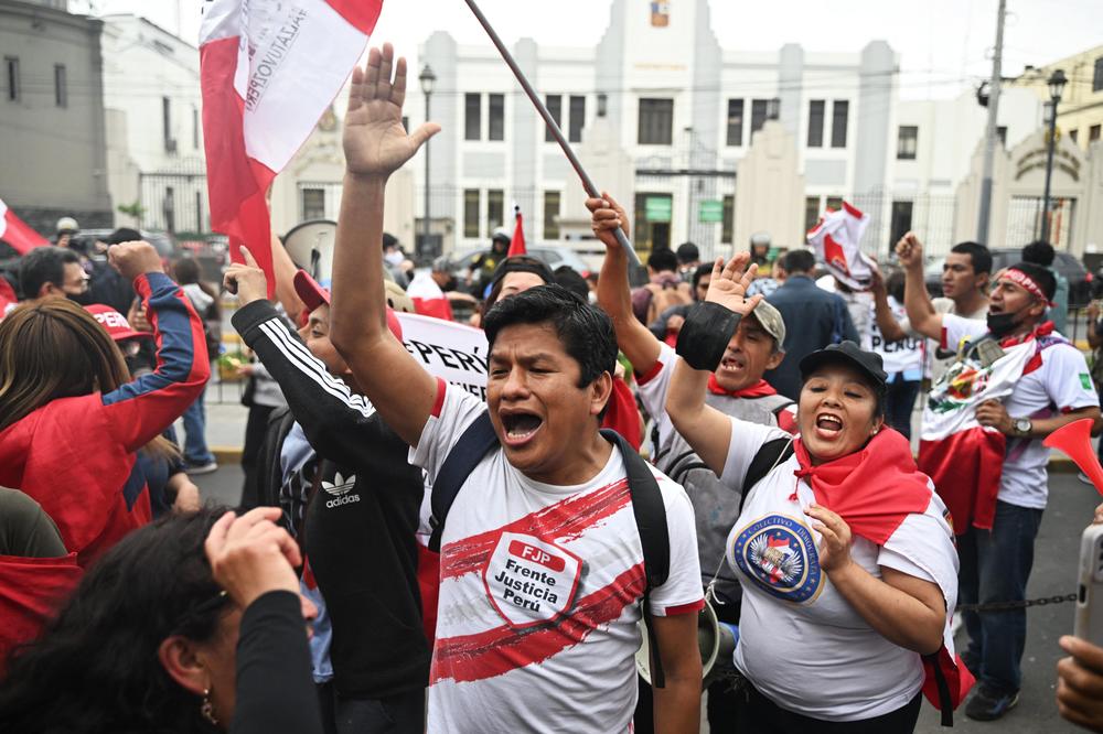 Opposers to Peruvian President Pedro Castillo protest outside the Lima Prefecture on Wednesday.