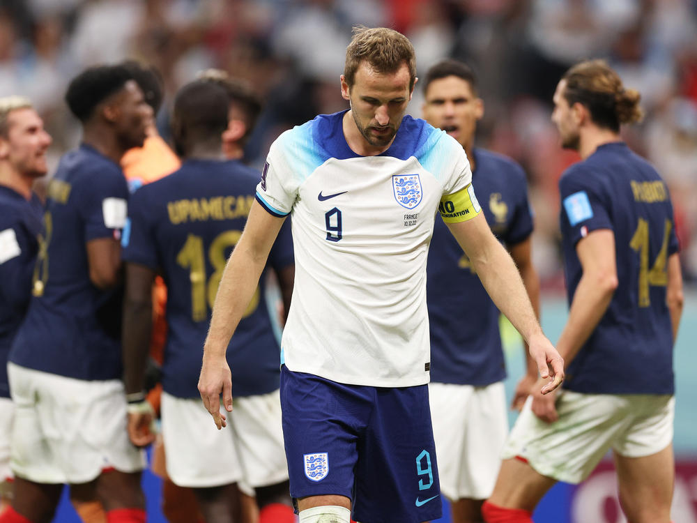 Harry Kane of England reacts after missing a penalty against Hugo Lloris of France during the World Cup quarterfinal match between England and France.