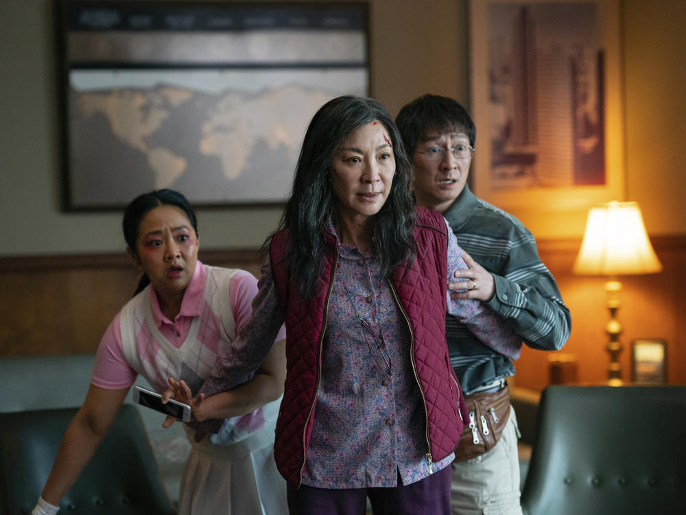 This image released by A24 Films shows, from left, Stephanie Hsu, Michelle Yeoh and Ke Huy Quan in a scene from <em>Everything Everywhere All At Once</em>.