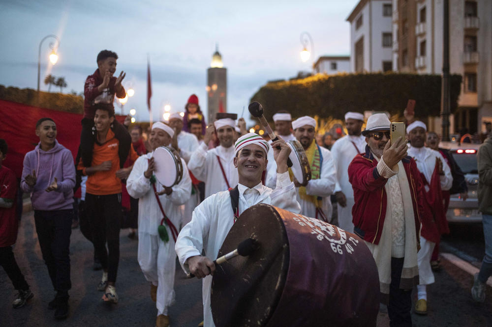 Moroccans celebrate in Rabat, Morocco, on Saturday, Dec. 10, after Morocco defeated Portugal in a 2022 World Cup quarterfinal match played in Qatar.