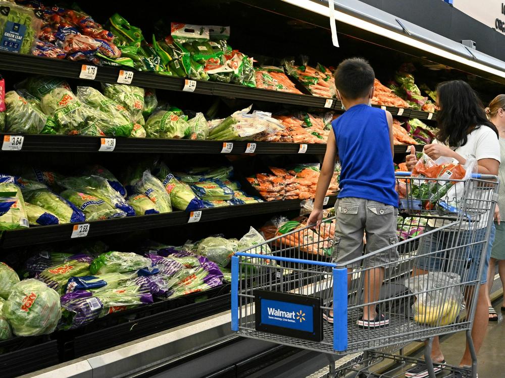 Consumers shop in the produce section of a Walmart store in Burbank, Calif., on August 15, 2022. Produce prices have been rising recently, the latest area hit by inflation.