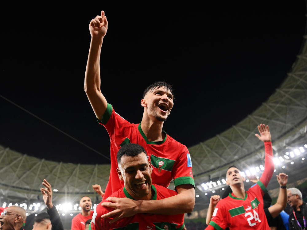 Achraf Dari and Walid Cheddira of Morocco celebrate after the 1-0 win during the quarterfinal match between Morocco and Portugal at Al Thumama Stadium on Saturday in Doha, Qatar.