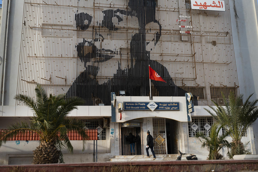 Mohamed Bouazizi's portrait covers the building that houses the post office in Sidi Bouzid.