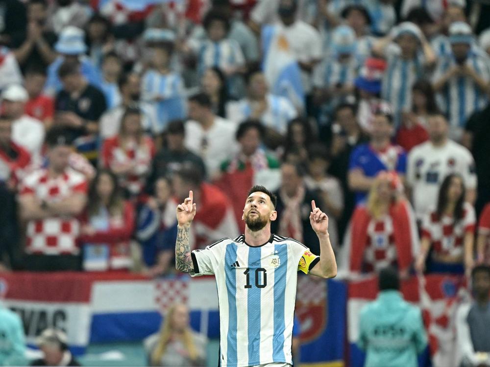 Argentina forward Lionel Messi celebrates scoring his team's first goal from the penalty spot during the World Cup semifinal match between Argentina and Croatia in Qatar on December 13, 2022.