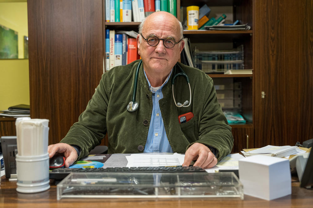 Germany's limits on how much patients pay out-of-pocket at the doctor's office have been critical to ensuring people get needed care, especially in a mining region where many battle lung diseases and chronic pain, says Dr. Eckart Rolshoven. 