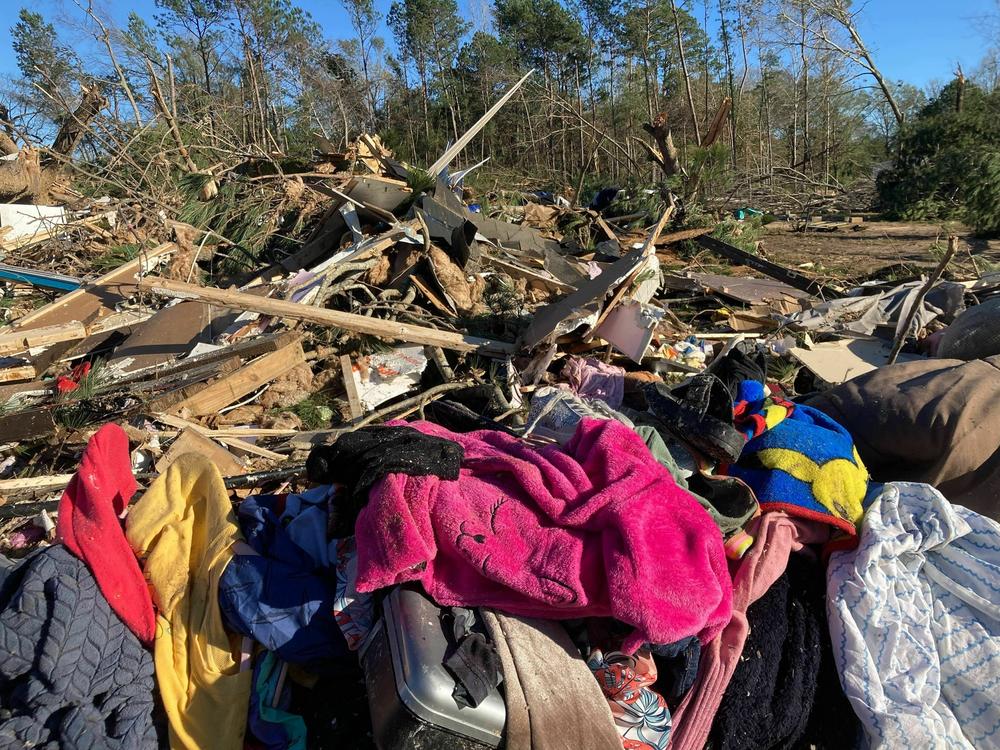 Debris is strewn about following severe weather Wednesday, Dec. 14, 2022, in Keithville, La. A volatile storm ripping across the U.S. spawned tornadoes that killed a young boy and his mother in Louisiana, smashed mobile homes and chicken houses in Mississippi and threatened neighboring Southern states with more punishing weather Wednesday.