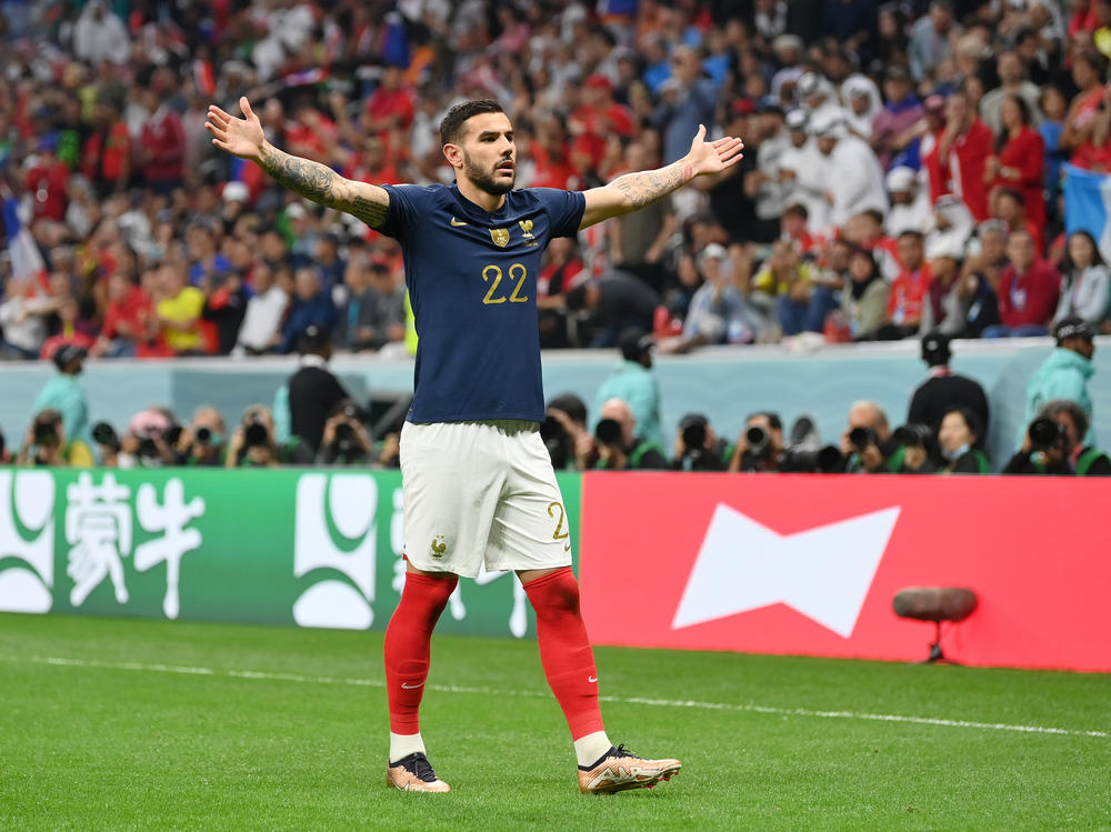 Theo Hernández of France celebrates after scoring the team's first goal during the 2022 World Cup semifinal between France and Morocco on December 14, 2022 in Al Khor, Qatar.