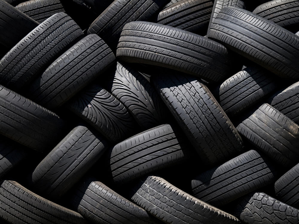 Used tires stacked at a Goodyear auto service location in South San Francisco, Calif., on July, 2020.