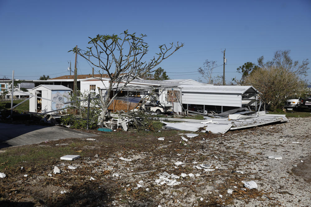 Debris from damage left by Hurricane Ian is seen in a mobile home park on Pine Island, Fla. on Oct. 28, 2022.
