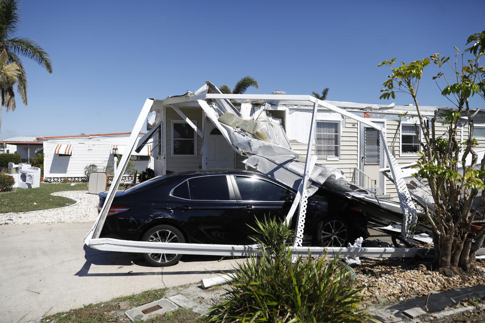 Debris from the damage left by Hurricane Ian is seen in a mobile home park in Fort Myers, Fla. on Oct. 27, 2022.