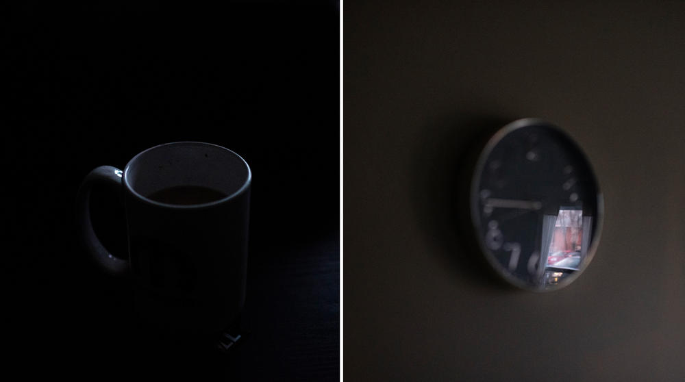 Dim light reflects off a mug (left) and a clock on the wall in Crittenden's home.