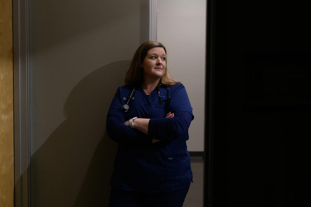 Veterinarian Dr. Remington Pettit poses for a portrait on Dec. 12, 2022, in Stillwater, Okla.