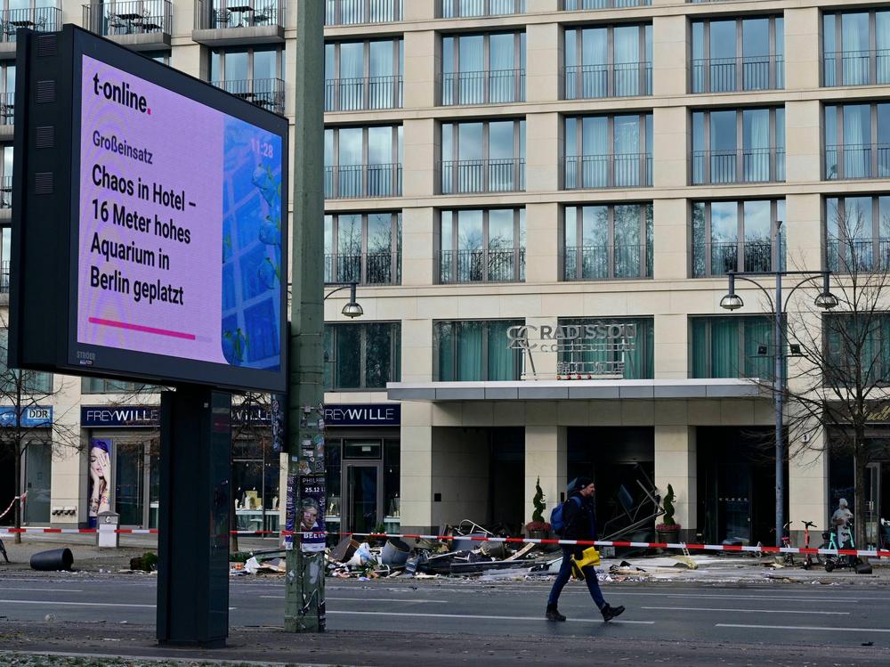 A screen displays the news 