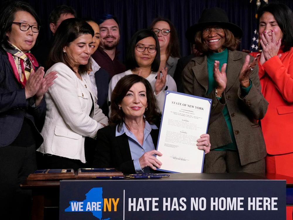 Attendees applaud after New York State Gov. Kathy Hochul announced actions to combat hate crimes at her office in New York City in November 2022. Hochul has formed a new unit to combat hate and bias across the state that will focus on education, early detection and mobilizing support in areas where a bias-related incidents have occurred.