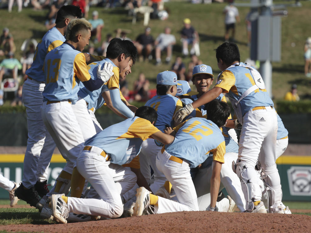 Players from the West Region team from Honolulu celebrate winning the Little League World Series championship game in August.