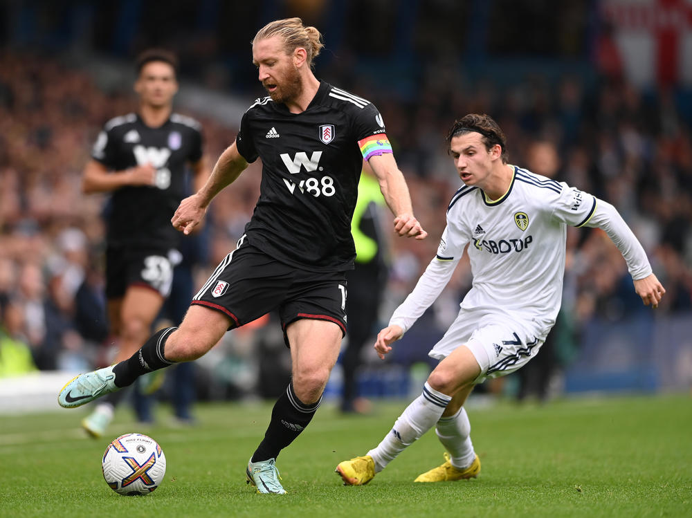 Two U.S. men's national team players — Tim Ream, left, and Brenden Aaronson, right — playing for their respective English Premier League teams in October.