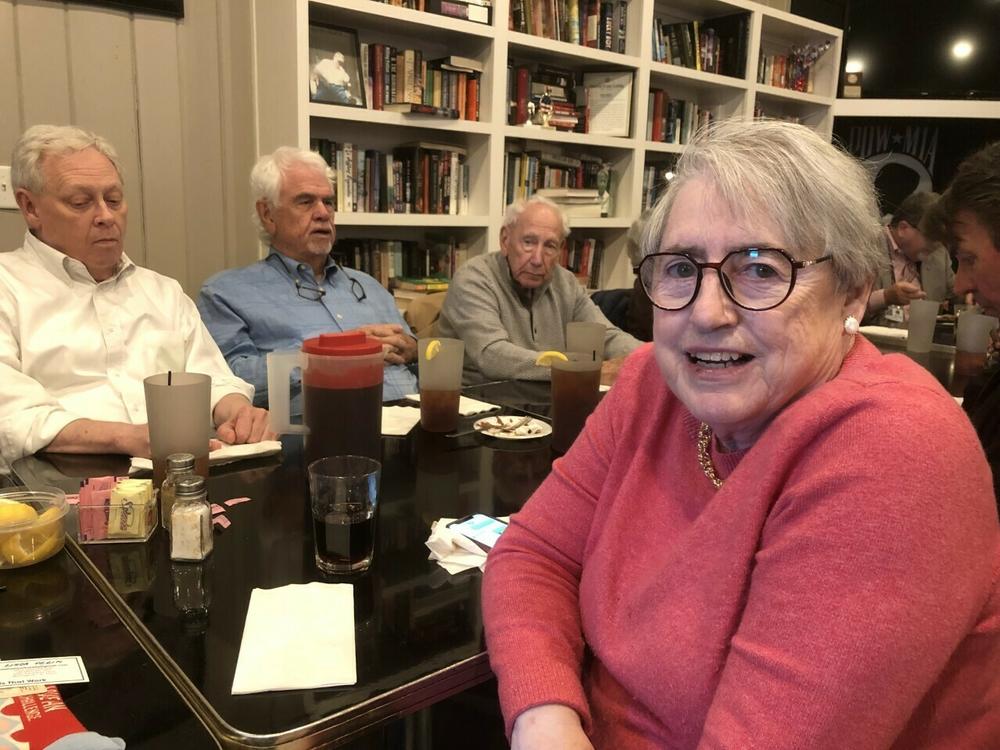Retired political scientist Natalie Davis and a group of others gathered at the lunch buffet at the American Legion in Homewood, Ala. She worries about what will be lost when <em>The Birmingham News</em> is gone.