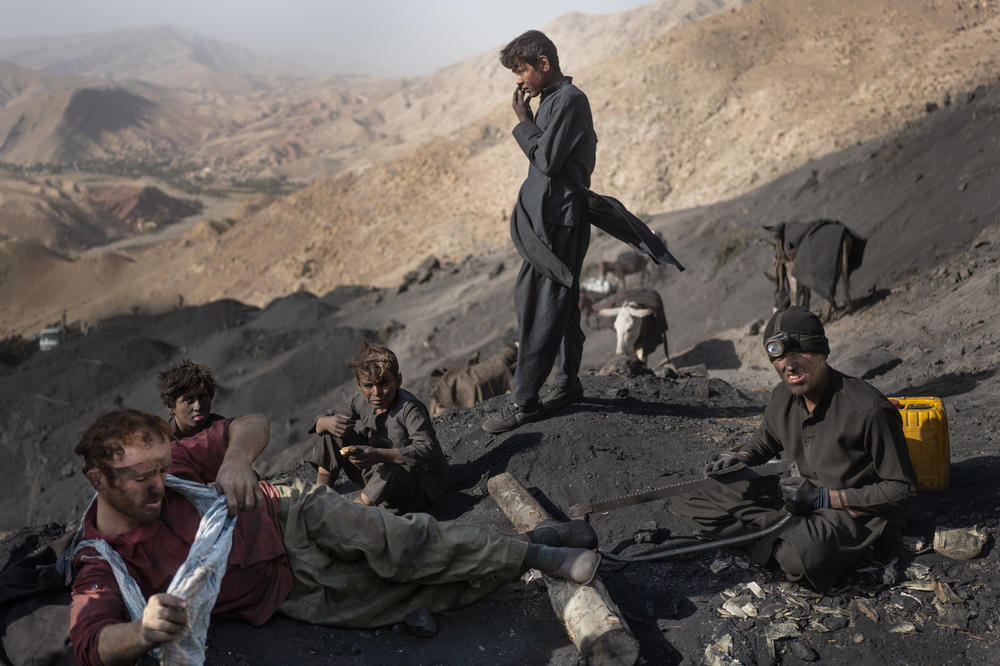 Boys earn between $3 and $8 for a day's work in the coal mines.