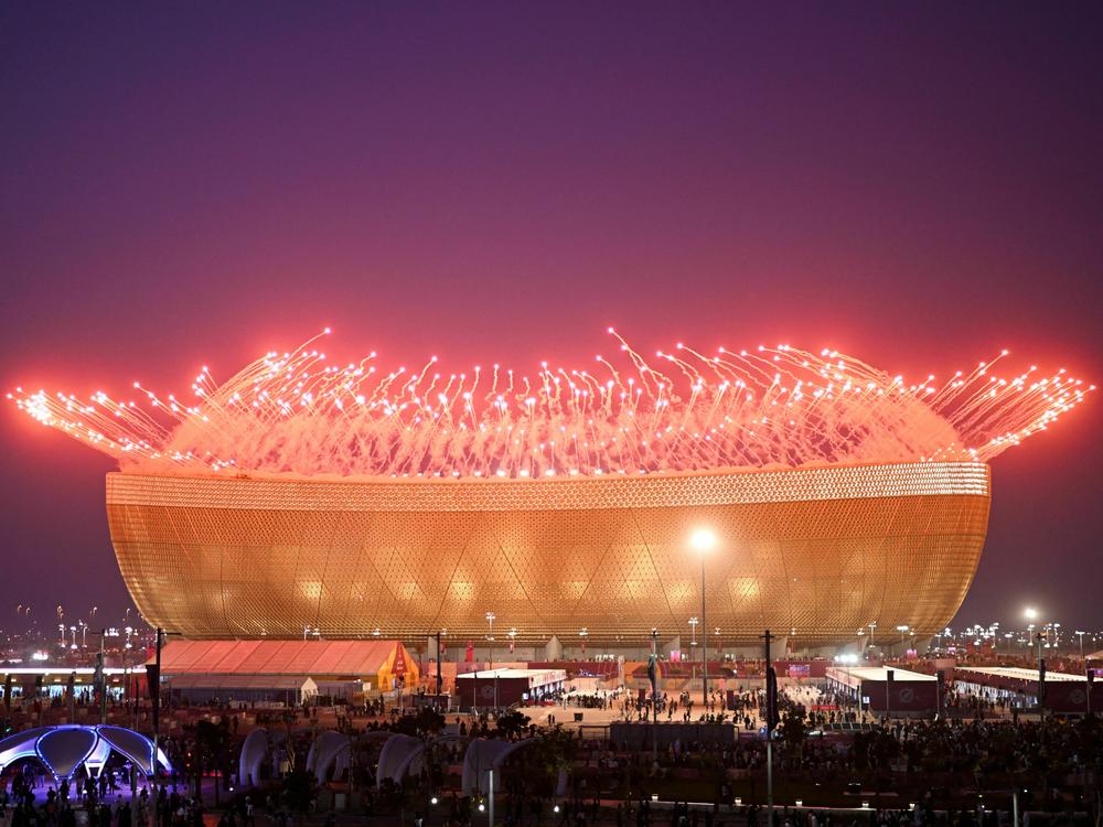Fireworks are pictured before the start of the Qatar 2022 World Cup final match between Argentina and France at Lusail Stadium north of Doha on December 18, 2022.
