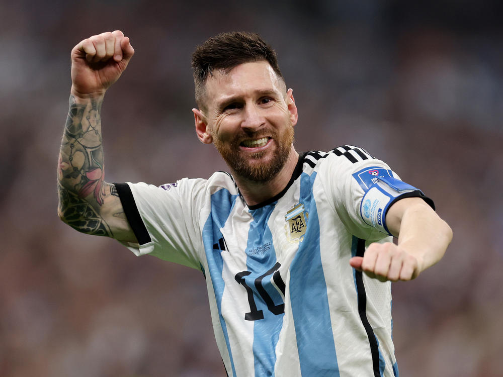 Lionel Messi of Argentina celebrates after scoring the team's third goal during the FIFA World Cup Final match between Argentina and France on December 18, 2022 in Lusail City, Qatar.