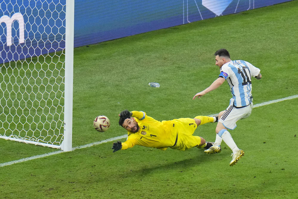 Argentina's Lionel Messi scores his team's third goal during the 2022 World Cup final with France on Sunday, Dec. 18, at the Lusail Stadium in Lusail, Qatar.