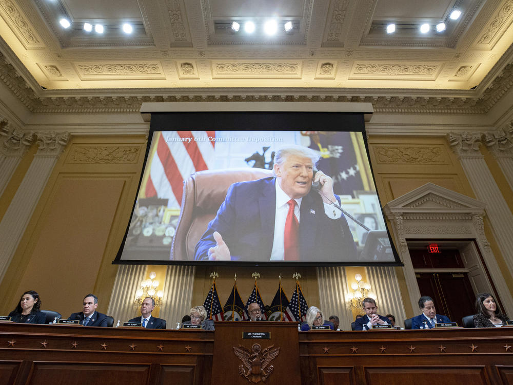 A video of former President Donald Trump is shown on a screen as the House select committee investigating the Jan. 6 attack on the U.S. Capitol holds its final meeting on Capitol Hill Monday.