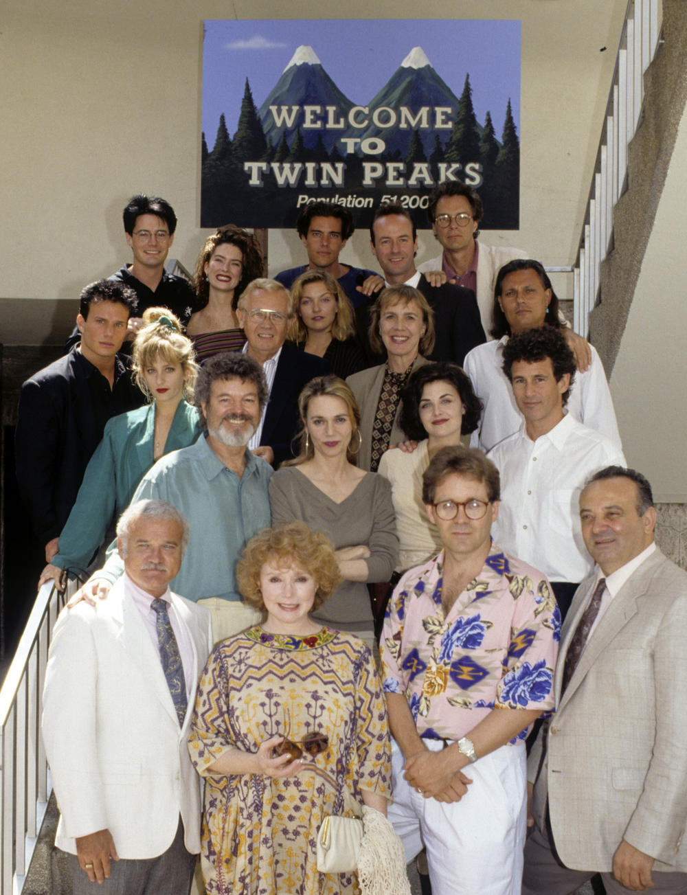Badalamenti, bottom right, with the cast of <em>Twin Peaks</em> in a photo taken July 7, 1990.