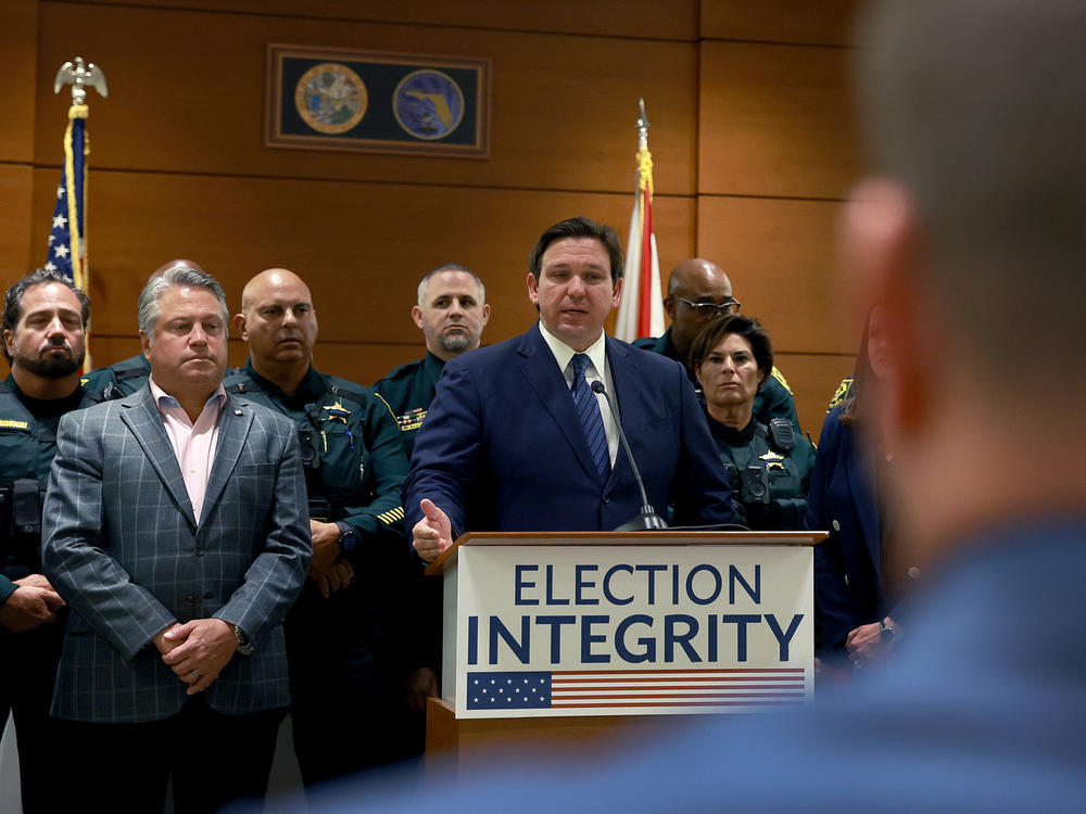 Florida Republican Gov. Ron DeSantis speaks during an Aug. 18 news conference to announce that the state's new Office of Election Crimes and Security was in the process of arresting 20 individuals across the state for voter fraud.
