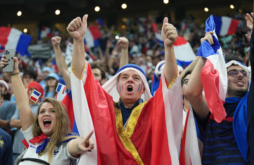 France's fans cheer their team on during the 2022 World Cup final against Argentina on Sunday, Dec. 18, at the Lusail Stadium in Lusail City, Qatar.