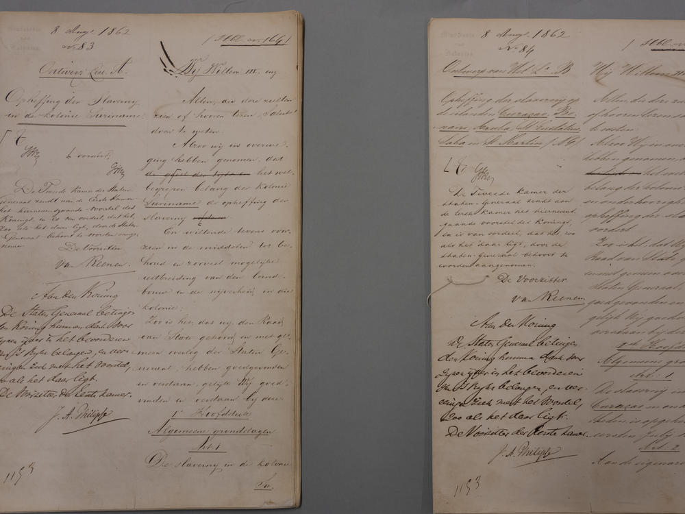 Legislation signed on Aug. 8, 1862, abolishing slavery on July 1, 1863, is shown at the National Archives in The Hague, Netherlands, Monday, Dec. 19, 2022.