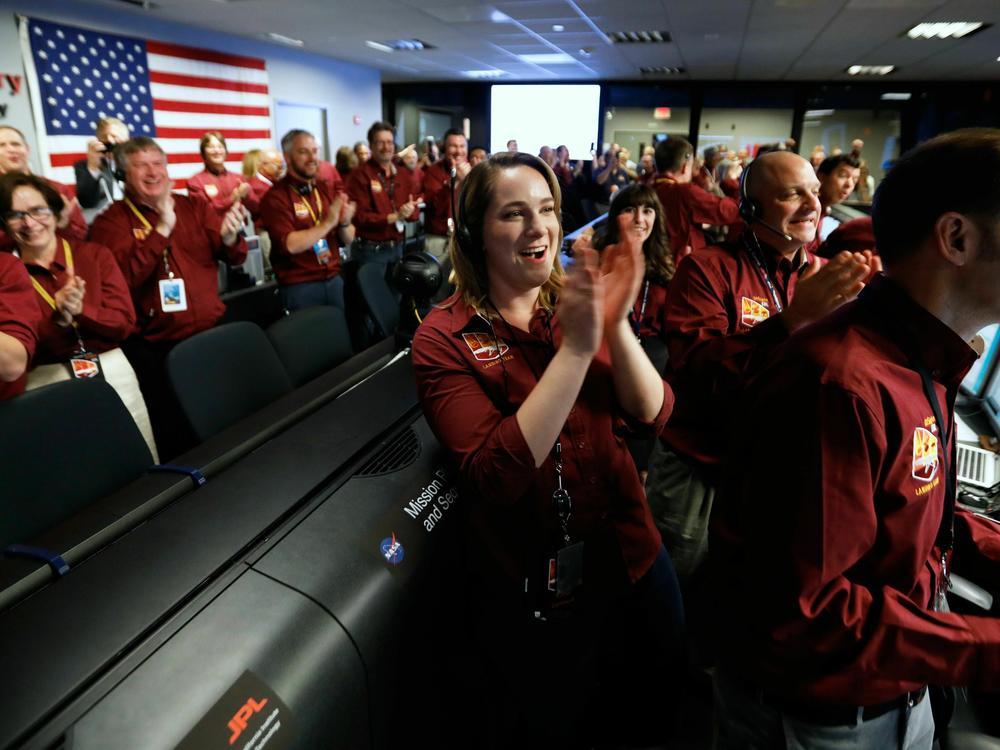 NASA engineers celebrate after InSight lands on Mars in Nov. 2018.