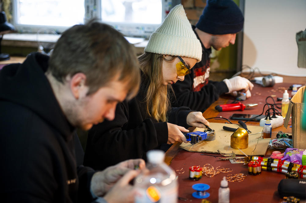 Volunteers with an organization called Power Kit assemble power banks from batteries recovered from disposable vape pens in Kyiv on Dec. 3. The group says it has received over 5 tons of donated vape pens, which are free to ship through Ukrainian delivery service Nova Poshta, and have created over 850 power banks, which are provided to the military for free.
