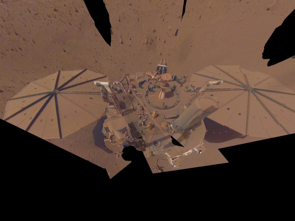 NASA's InSight Mars lander is covered in dust in its final selfie, taken on April 24. The following month its robotic arm was put into resting position, aka 