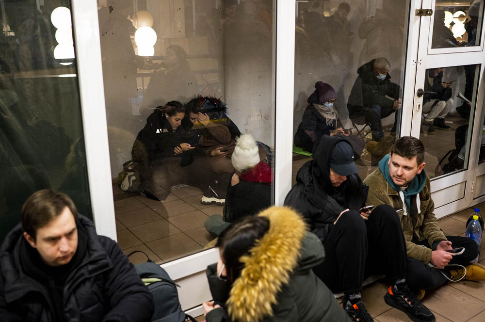 Civilians take shelter in the Akademmistechko Metro station during an air alert in Kyiv, as Russian forces renewed missile attacks across Ukraine on Dec. 5.
