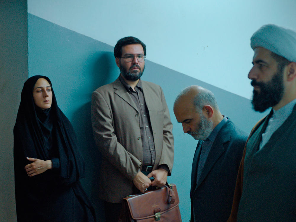 Zar Amir Ebrahimi and Arash Ashtiani as Rahimi and Sharifi in <em>Holy Spider.</em>