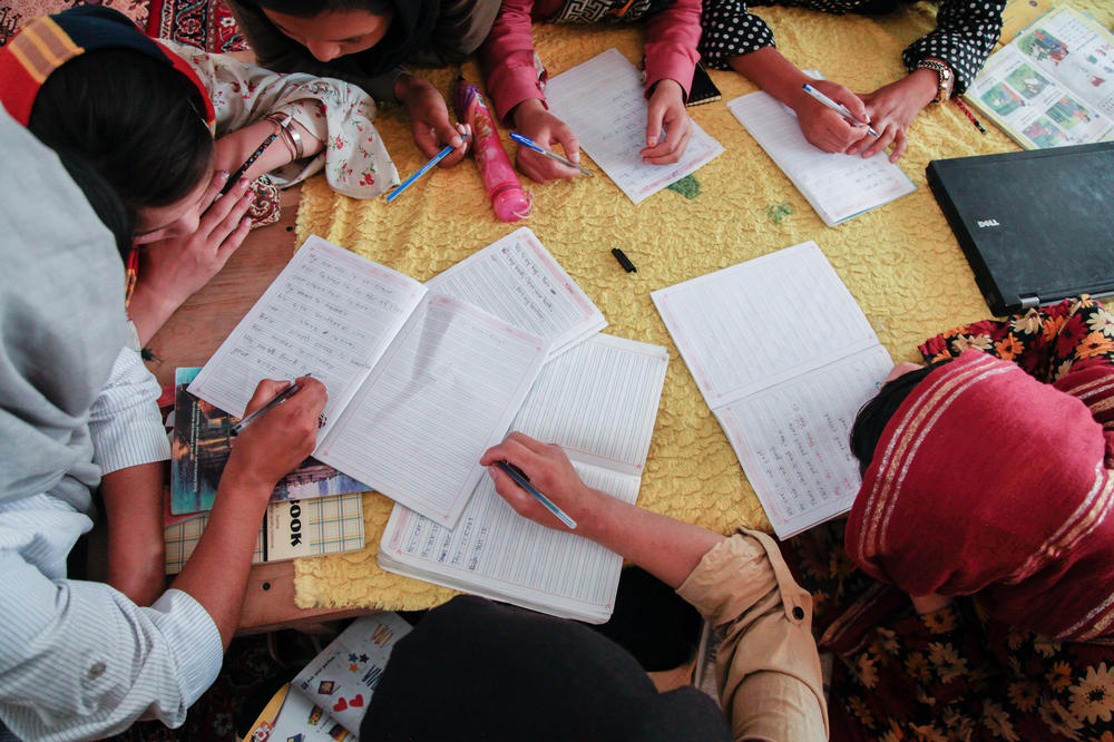 Girls study at a secret school on the outskirts of Kabul in July of 2022.