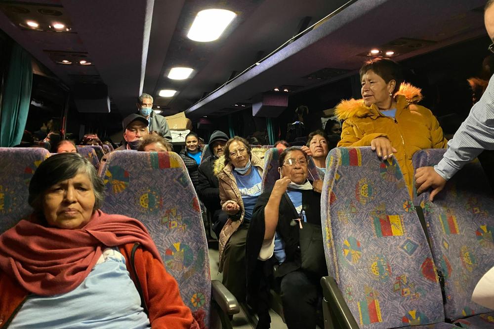 Elitania Tellez Maldonado and Camilo Rodriguez Mares wait on the bus after arriving in Birmingham, Ala., from Michoacan, Mexico.