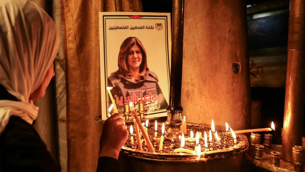 A poster depicting Shireen Abu Akleh