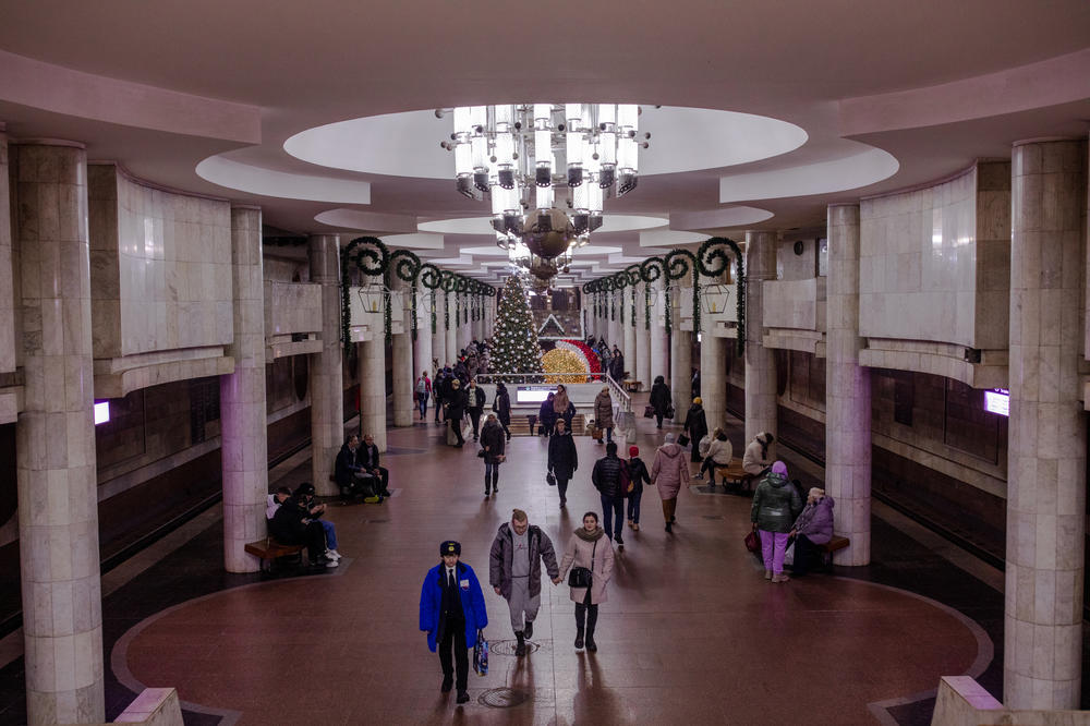 People visit a metro station in Kharkiv, Ukraine, to pose for photos with a Christmas tree and drop off letters to Grandfather Frost on Dec. 11.